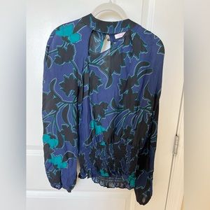 Parker cutout, long sleeve blouse.